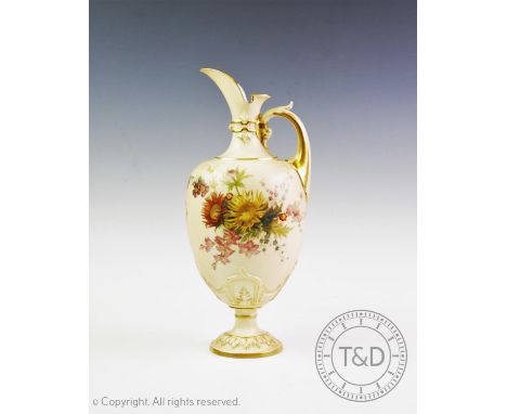 A Royal Worcester blush ivory ewer of pedestal baluster form, decorated with hand painted floral sprays, with gilt handle, ba