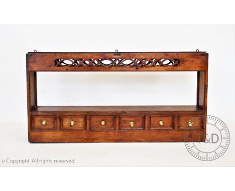 An 18th century and later oak and stained pine wall shelf, with six faux drawers, 61cm H x 120cm W x 21cm D 