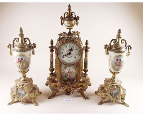 A reproduction gilt metal clock garniture with rococo style painted panels