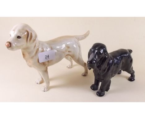 A Doulton black spaniel and a Goebel retriever
