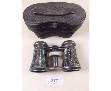 A pair of mother of pearl clad opera glasses by JS Steward in fitted case