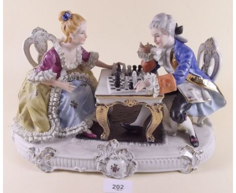 An Italian group of couple playing chess
