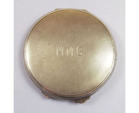 A silver compact