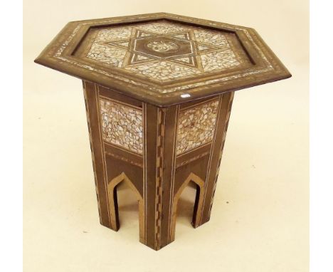 An Islamic octagonal mother of pearl inlaid occasional table