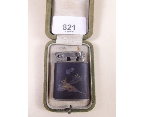 A Japanese Komai cigarette lighter decorated landscape