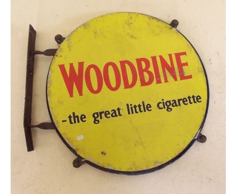 An antique 'Woodbine' cigarettes double sided enamel advertising sign on bracket - 46cm dia