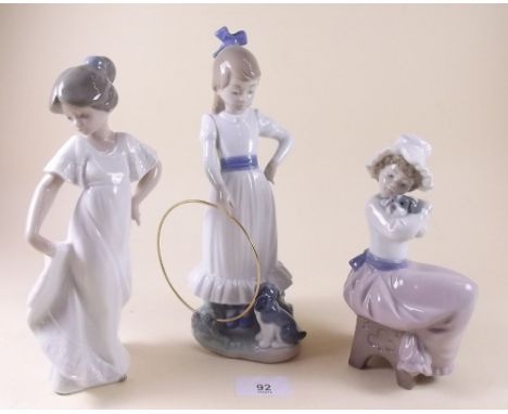 Three Nao figures of girls