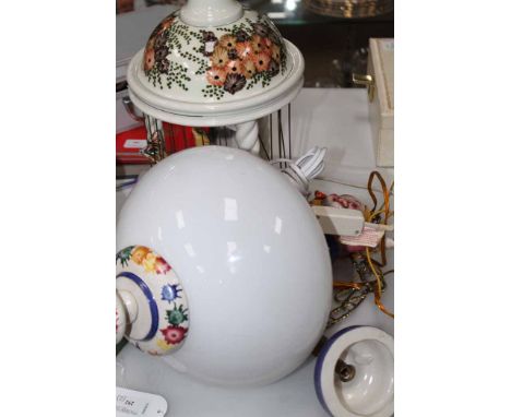 TWO NOVELTY CERAMIC LIGHTS
comprising a clown figure ceiling light fixture and a ceramic bird cage table lamp, ceiling light 