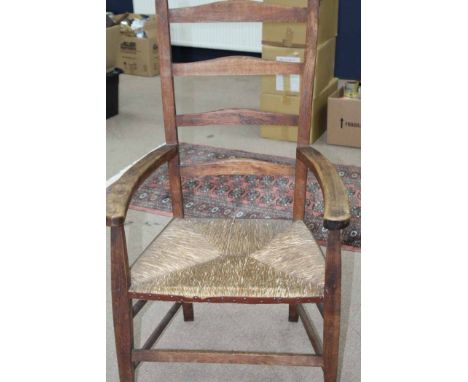 LARGE ARTS & CRAFTS CLISSET ARM CHAIR
with ladder back and rush seat, 115cm high 