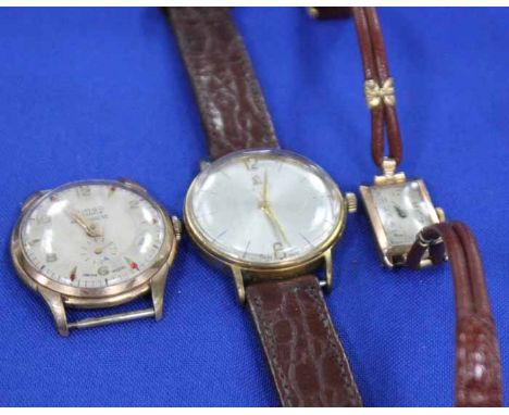 LADY'S 9CT GOLD COCKTAIL WATCH
together with two manual wind gent's watches (3)