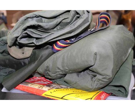 SELECTION OF VINTAGE MILITARY ITEMS
including green canvas clothes, gas mask with original instructions in a canvas bag, some