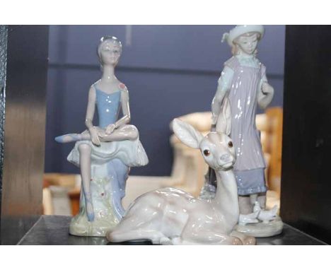LLADRO FIGURE OF A DEER
together with a lladro figure of a girl feeding doves and a similar figure of a ballerina 