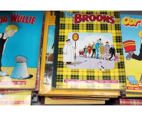 LOT OF OOR WULLIE AND THE BROONS ANNUALS
in a blue travel trunk
