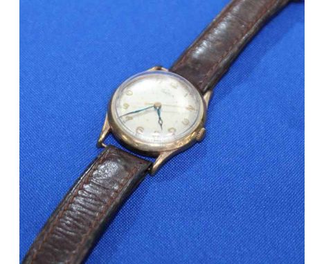GENT'S AUDAX 9CT GOLD WRISTWATCH
the dial with Arabic numerals, signed manual wind movement, fitted to a brown leather strap