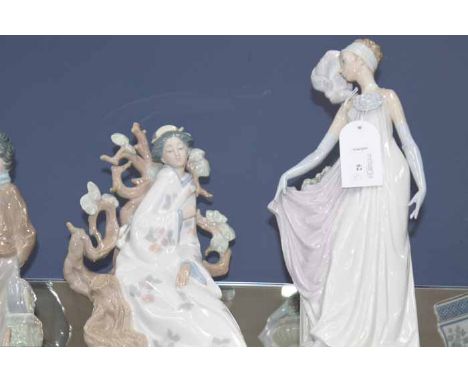 FIVE LLADRO AND NAO FIGURES
including a Lladro figure of a 1930's lady dancer, a Lladro figure of a geisha, a lladro figure o