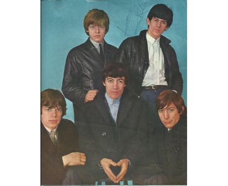 Rolling Stones members signed on two magazine photos, 6 x 4 b/w dark photo signed by Bill Wyman not good contrast, green auto