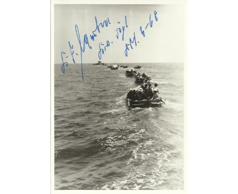 K F Merten U68 Commander WW2 signed 6 x 4 inch black and white photo. Picture of crew in boats on way out to U68. Good Condit