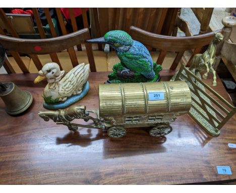 Mixed metalware to include a brass model of a caravan and horse, another of a horse jumping a fence, two painted cast iron do
