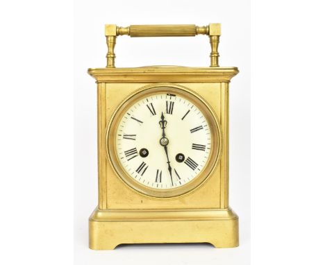 An early 20th century French gilt metal large carriage clock with integrated thermometer and compass to the top. The enamel d