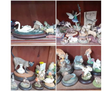 A quantity of mainly late 20th century Border Fine Arts composition models and figure of a fairy to include a signed model of