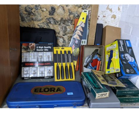 Tools to include an Elora socket set, a vintage Black and Decker multi-tool set in a case, Stanley chisels, router bits, and 