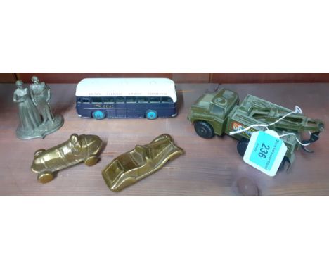 A vintage Dinky BOAC bus, a Matchbox Battle Kings 66 Repair tow army vehicle and other itemsLocation: RWBIf there is no condi