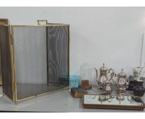 A mixed lot to include a silver plated tea set together with a brass fire screen and other itemsLocation:If there is no condi