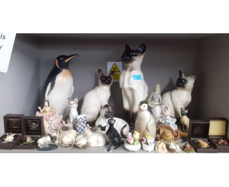 A mixed lot to include Country Artist composition models of animals, Royal Doulton models of cats and other ornaments A/F to 