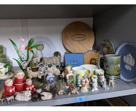 A selection of ceramic and glass ornaments to include a set of Sommelier Jersey pottery plates decorated with original illust