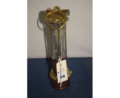 A 19th Century Davy Lamp with hinged (bridge), top cover stamped W. Mason, fitted a sliding copper reflector and copper oil v