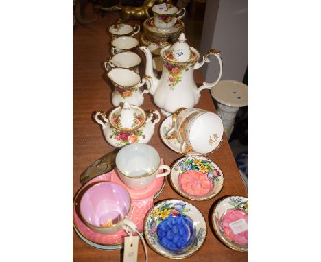 A Royal Albert 'Old Country Roses' pattern part tea set, for six place settings, with teapot, cream and sugar; together with 