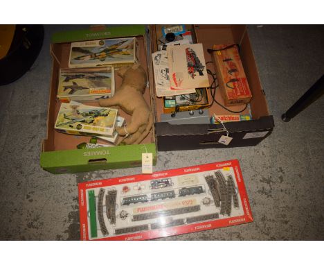 Boxes containing Airfix and Matchbox model aeroplane kits; together with a Fleischmann Piccolo 9372 electric train set; etc.