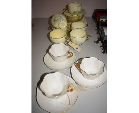 A nineteen-piece New Chelsea 'Water Lily' pattern part tea service; together with three Shelley cups and saucers.