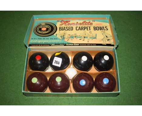 A set of 'Henselite' (Junior) biased carpet bowls in original box, complete with jack and instruction pamphlet.