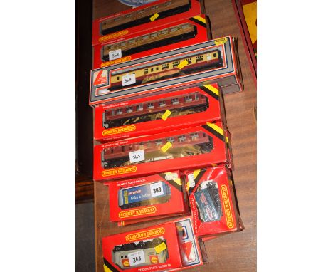 A collection of 00-gauge rolling stock, comprising: sixteen boxed coaches and goods wagons, various, including: two Lima coac