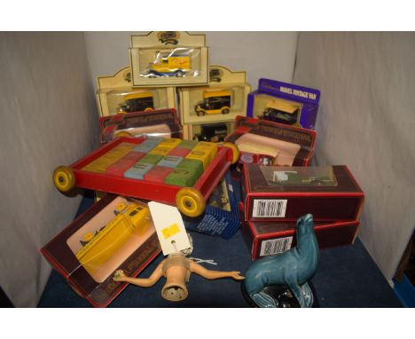 A collection of Matchbox and Lledo die-cast vintage model vehicles, mostly commercials; together with a Poole ware ornament m