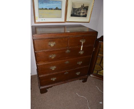 A 19th Century oak chest of two short and three long drawers with brass handles, raised on bracket feet.