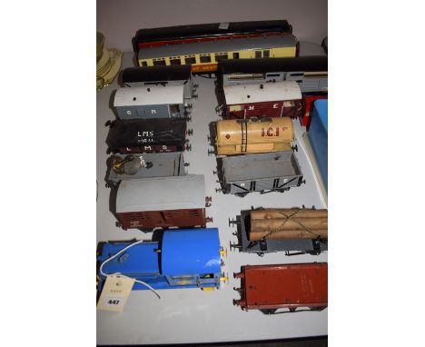 A scratch-built model railway goods engine; together with two railway carriages; a quantity of rolling stock; farmyard animal
