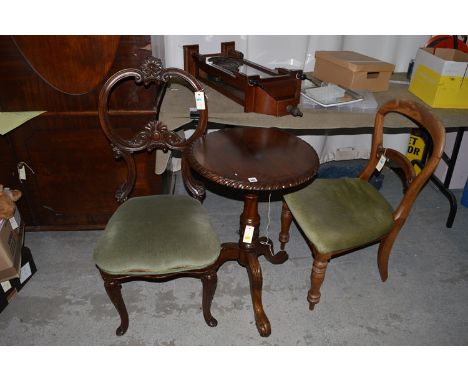 An early 20th Century mahogany occasional chair, with carved leaf scrolling back; a Victorian mahogany balloon back dining ch