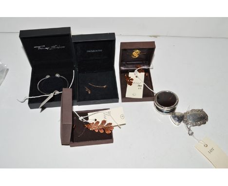 A Thomas Sabo silver bangle boxed; silver items to include: a sherry decanter label; two small pots; two 'Two Skies' items pe