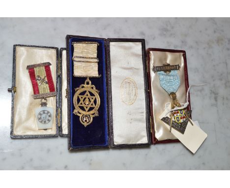 Three Masonic medallions, including: a silver gilt and enamel medallion for the 50th Year Of The Doegle Lodge.