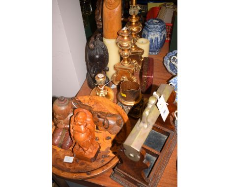 A collection of miscellaneous modern carved ornaments; an oak and white metal tantalus (no decanters); candles; and sundries.