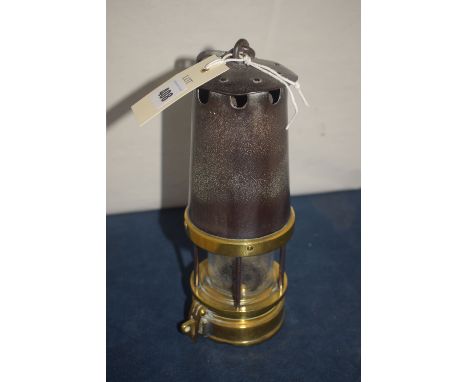 A Patterson & Co., Newcastle Upon Tyne B1 miner's lamp, with steel bonnet and five bars, fuel canister fitted hasp to lock it