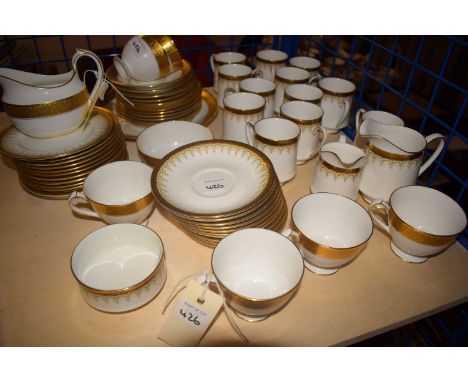 A Paragon 'Athena' pattern coffee set for twelve, to include: cream jug, sugar, cans, saucers and tea plates; together with a