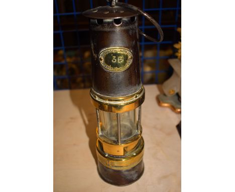 A miner's lamp made by the Wolfe Safety Lamp Company, Maurice Limited, Sheffield, No. 7RNBS.