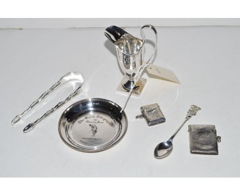 Silver items, to include: a pin dish "The Daily Telegraph and Morning Post Lady Golfers Tournament"; a helmet form cream jug;