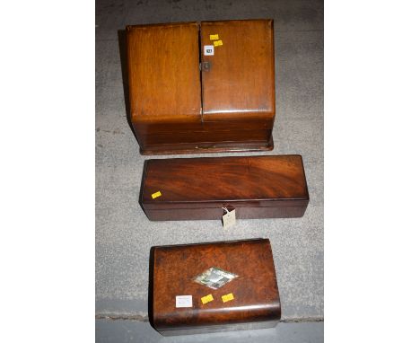 A Victorian walnut stationary box, fitted two doors revealing a fitted interior; together with a walnut work box with mother-