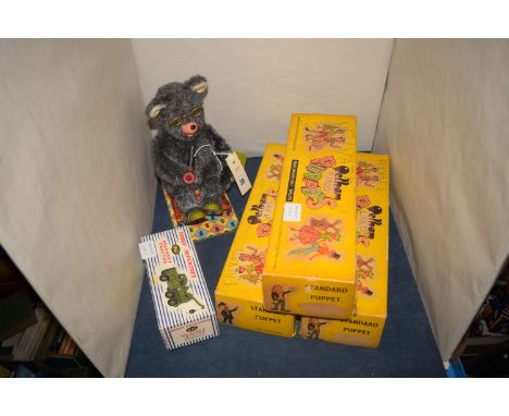 A battery operated tinplate toy in the form of 'Fairy Bear' in a rocking chair; together with Dinky Supertoys Model 661 recov