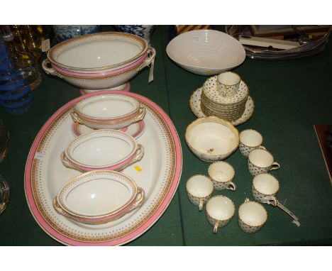 An antique part afternoon tea set decorated gold spots on cream ground; together with a modern Portmeirion oval bowl designed