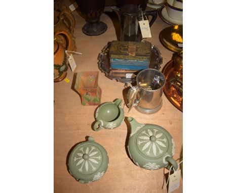 A small circular EPNS salver; a plated water jug; three-piece Jasper ware tea service; a pewter tankard; souvenir teaspoons; 